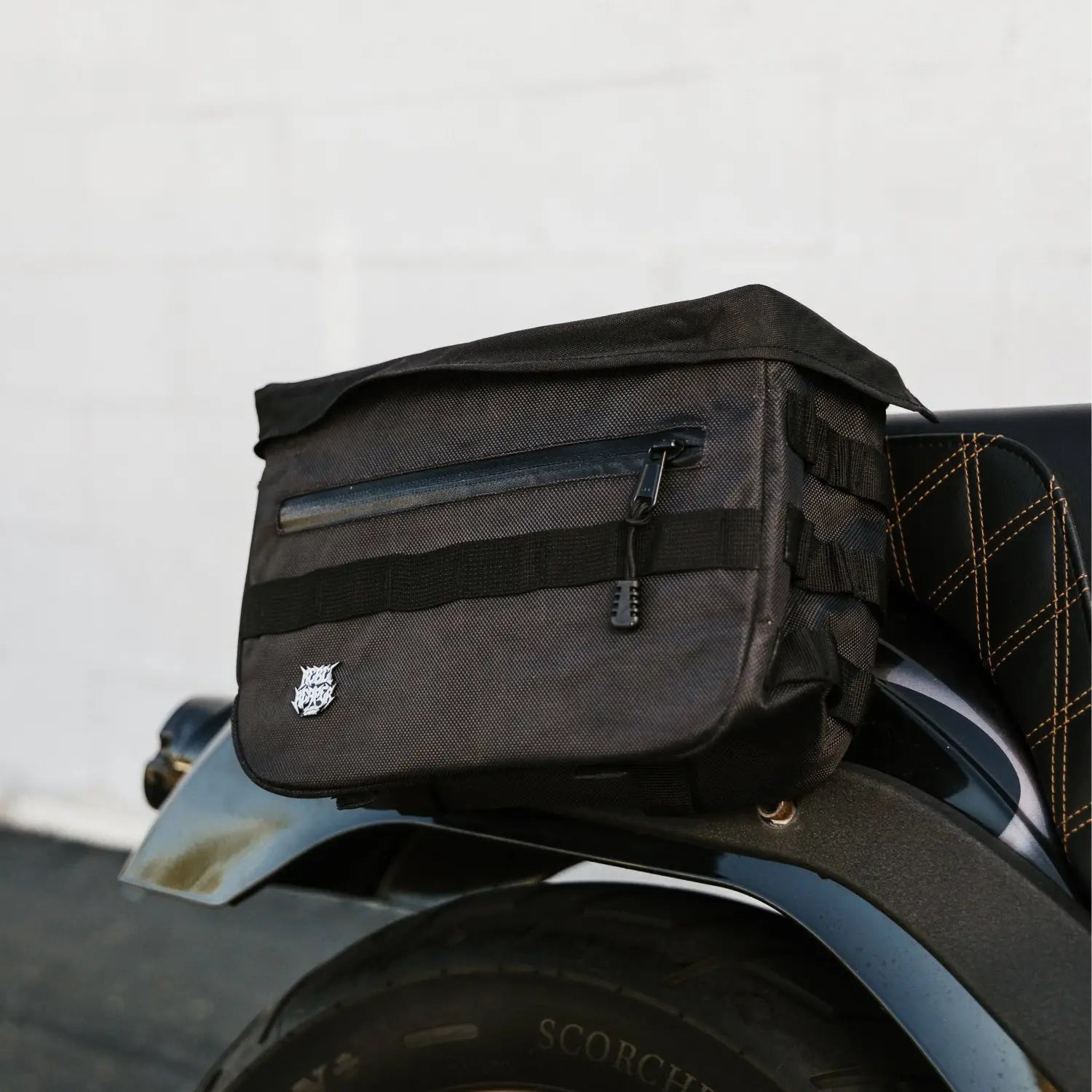 Black motorcycle tail bag from Doom Slinger Saddlebags with hidden waterproof pockets, Rebel Reaper style