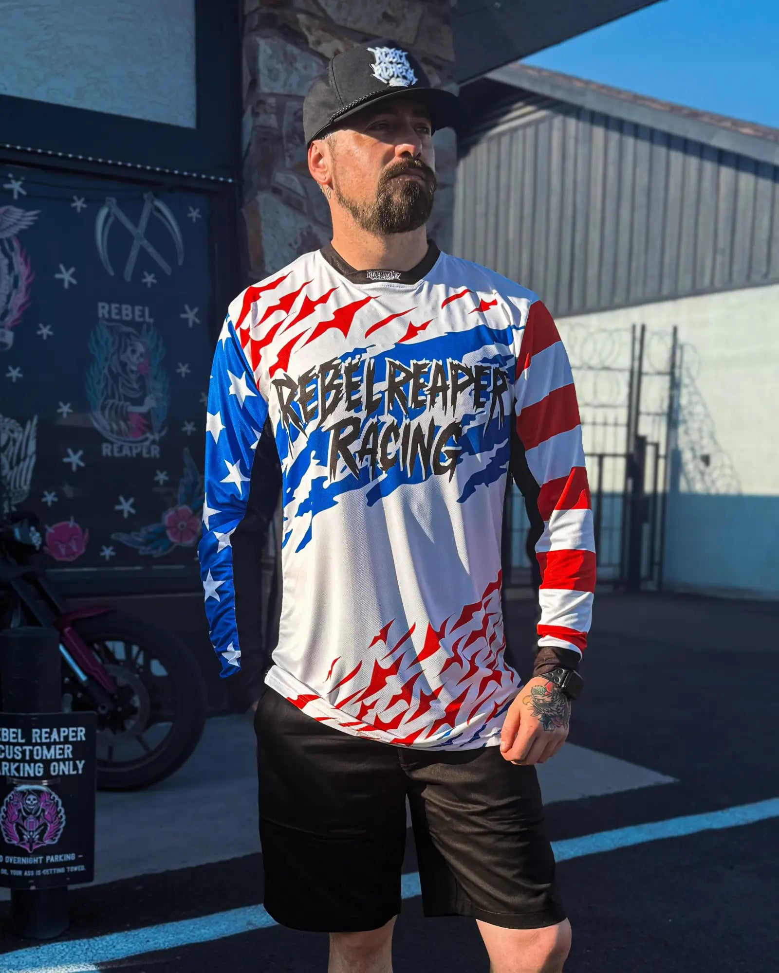 Man in Rebel Reaper® Mesh Racing shirt from Jerseys collection wearing Reapers Revenge Indigo Blue Denim Vest