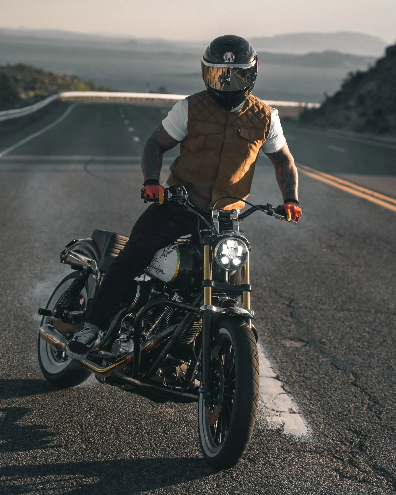 Motorcyclist on a winding road showcasing Rebel Reaper New Release in collection New Releases