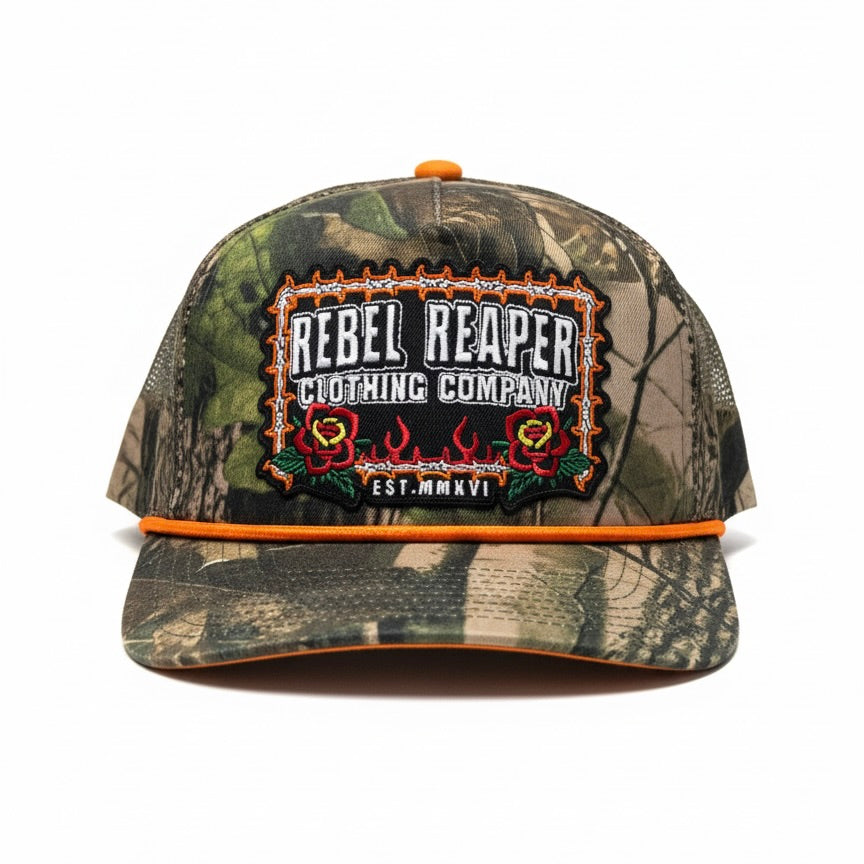 Camouflage cap with 'Rebel Reaper Clothing Company' logo on a white background