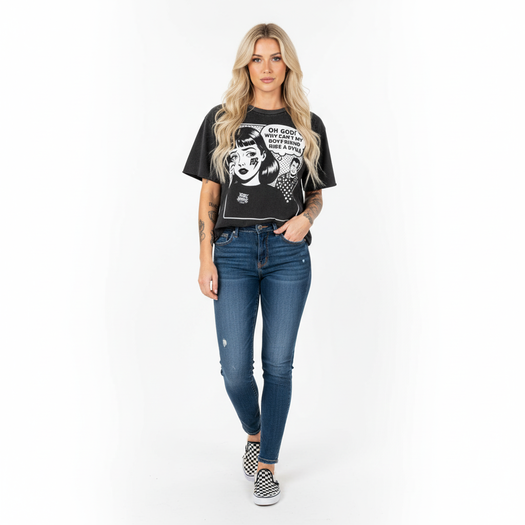 Woman wearing a black graphic t-shirt and blue jeans on a white background