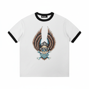 White t-shirt with black ringer sleeves featuring a graphic design of a skull with wings and text on a white background.