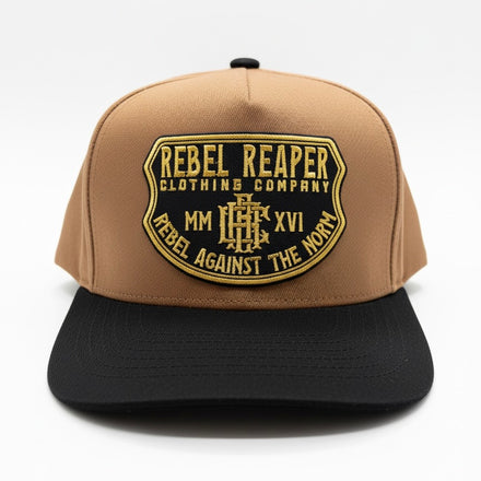 Tan and black cap with 'Rebel Reaper Clothing Company' logo on a white background