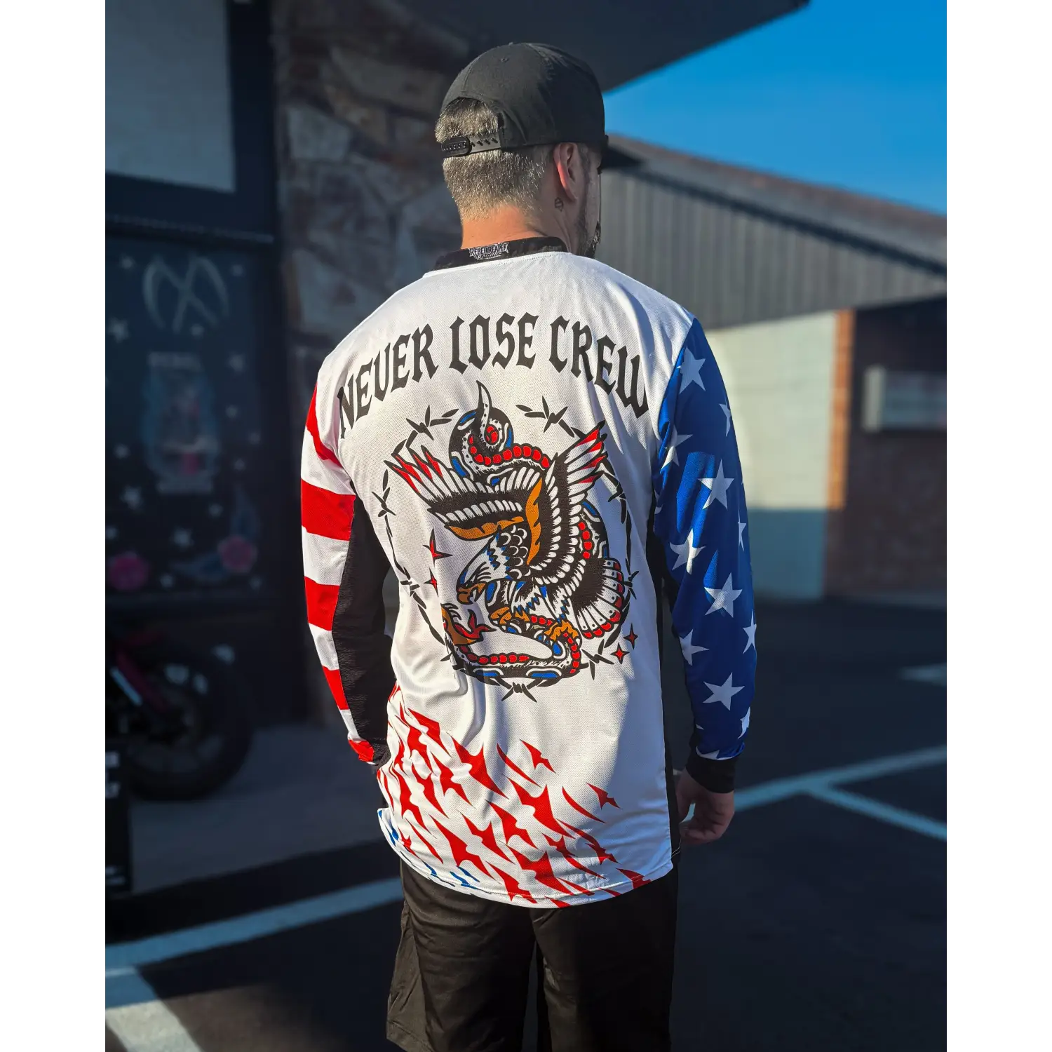 Graphic long-sleeved rebel reaper racing jersey with fly high and blow past design