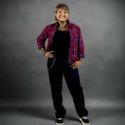 Person wearing a red plaid jacket on a white background