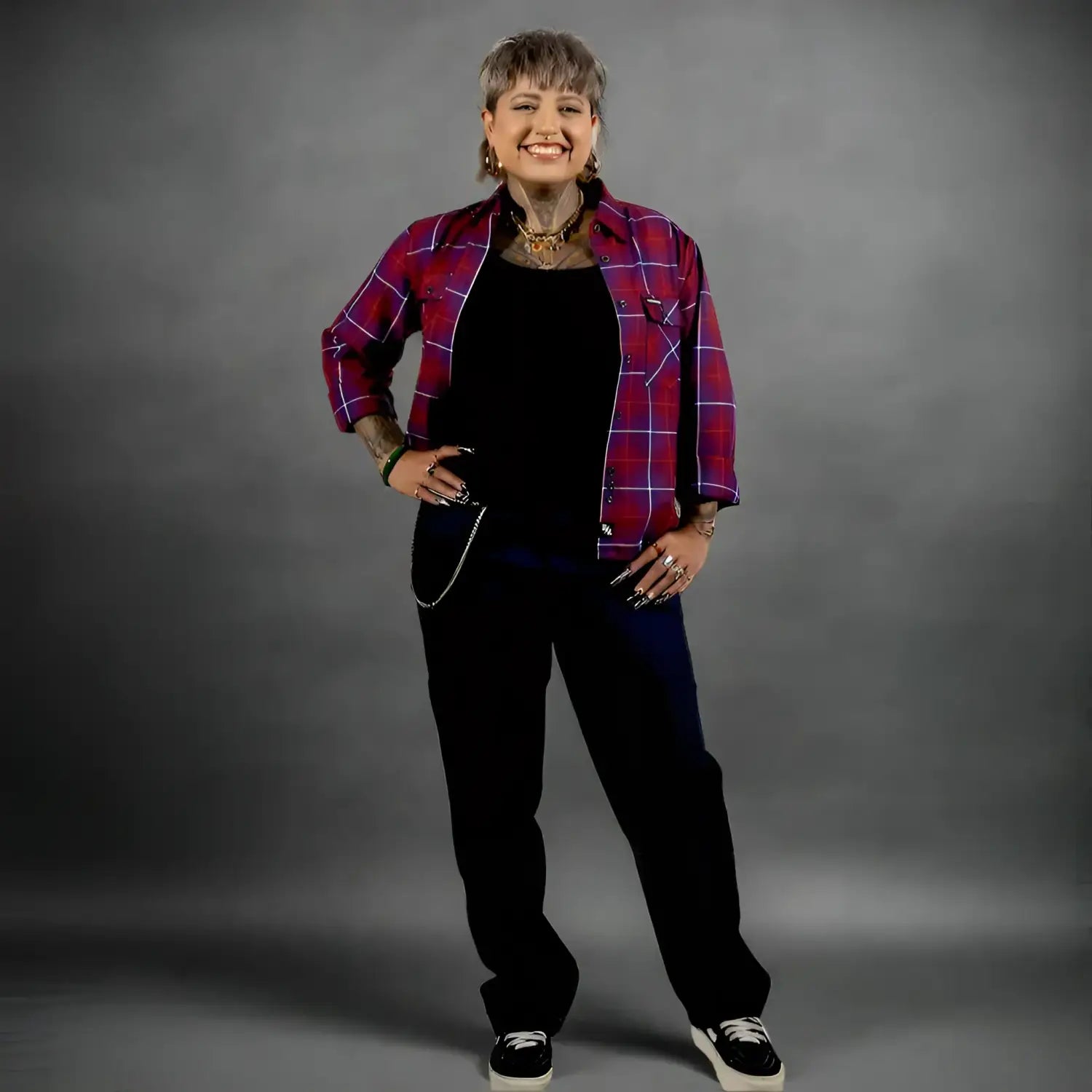 Person wearing a red plaid jacket on a white background