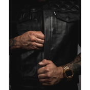 Black leather vest with YKK zippers and cowhide leather carry pockets for a stylish look