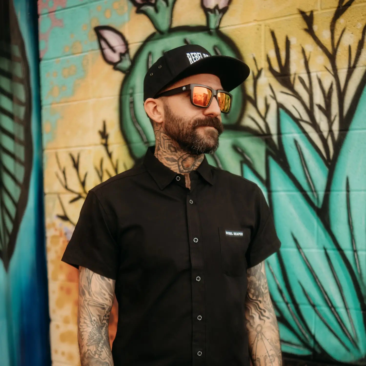 Man wearing Black Bamboo button-up shirt with hidden collar buttons in wrinkle-resistant bamboo fabric