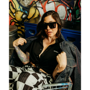 Woman in sunglasses wearing Black Bamboo Button Up Shirt S/S with wrinkle-resistant fabric