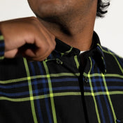 Black plaid shirt from Burton Men’s Flannel with hidden collar buttons and chest pocket slits