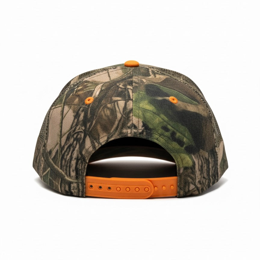 Camouflage baseball cap with orange accents on a white background