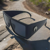 Black shield-style sunglasses from Dana Retro Squared Rebel Reaper collection with UV400 protection