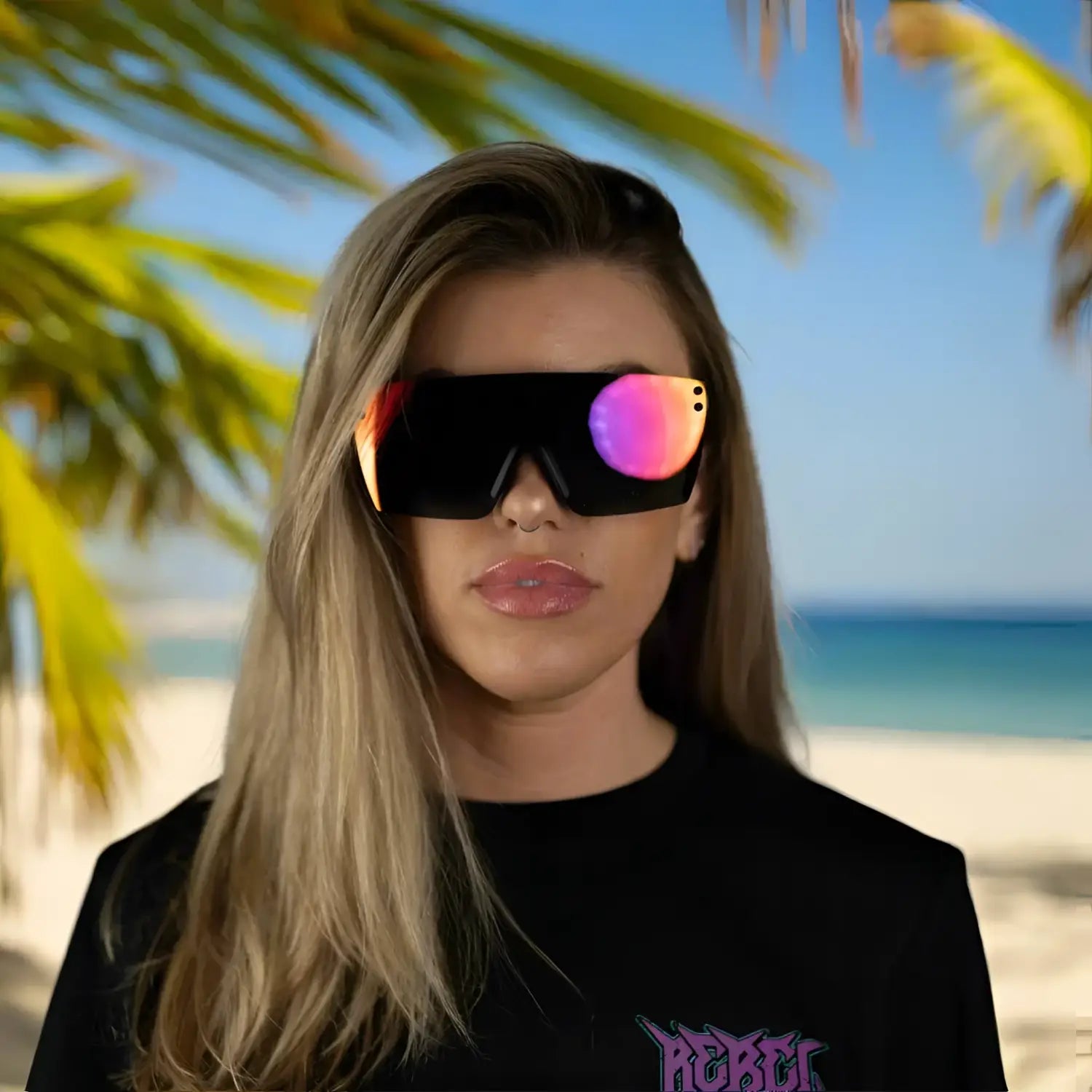 Woman wearing oversized sunglasses from Hogan Reflective UV Blocking Sunglass Collection with rebel reaper tattoo