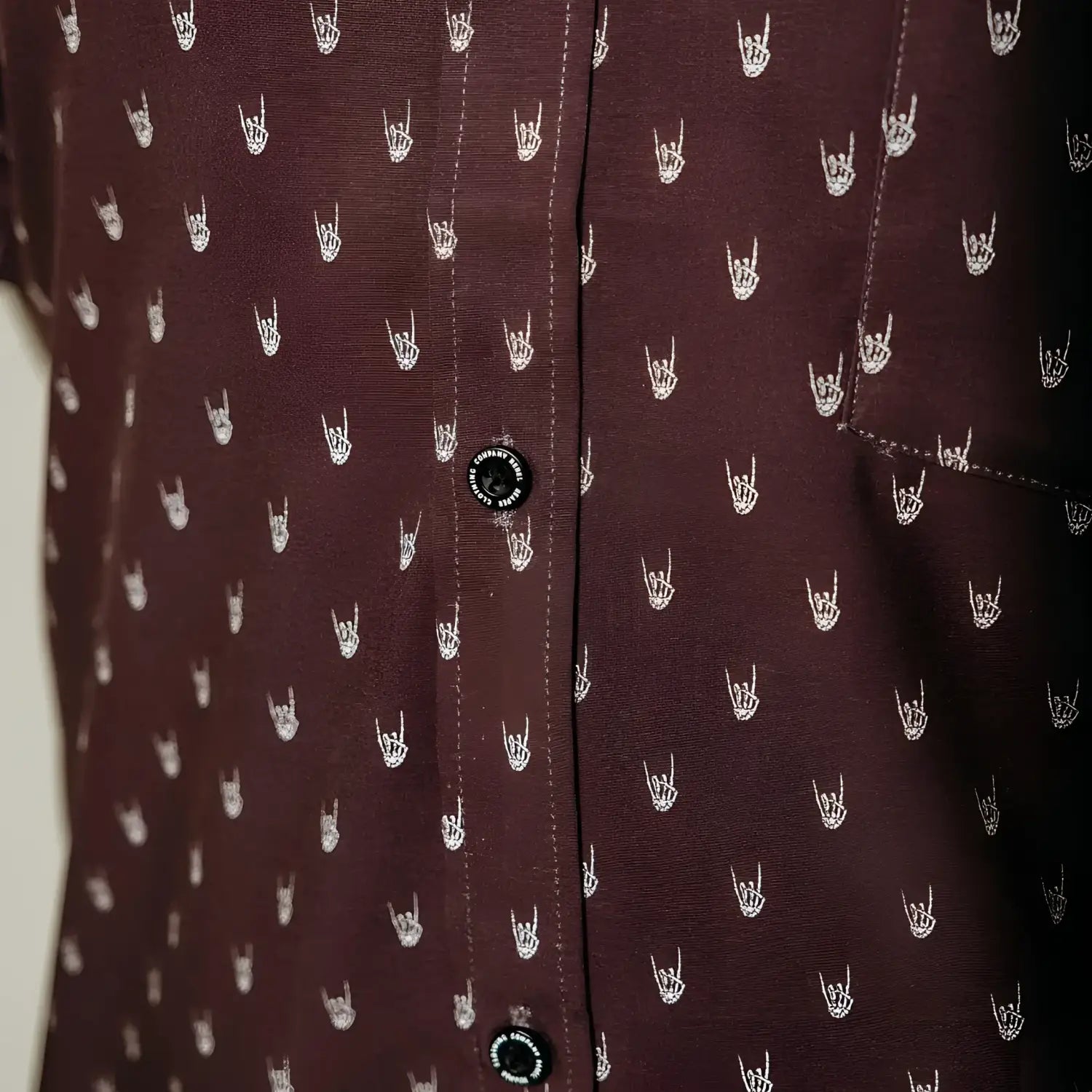 Burgundy shirt with midnight metal hands and rock hand pattern, wrinkle-resistant fabric