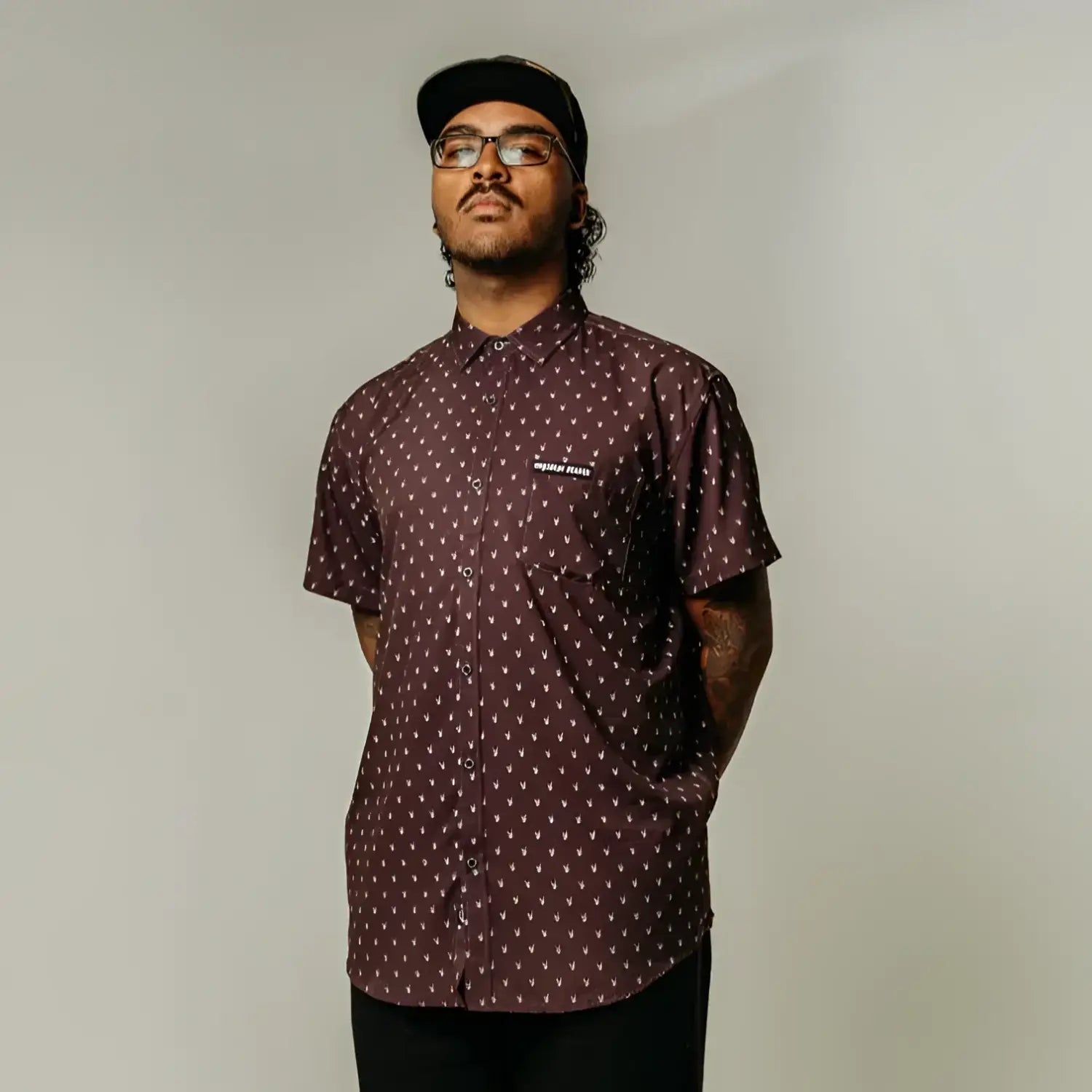 Maroon patterned short-sleeve shirt with hidden collar buttons from Midnight Metal Hands collection