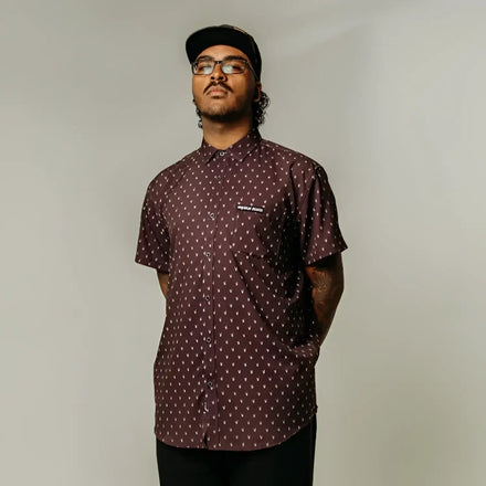 Maroon patterned short-sleeve shirt with hidden collar buttons from Midnight Metal Hands collection