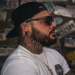 Man with tattoos and piercings wearing Party Shade Polarized Aviator Sunglass with UV400 protection
