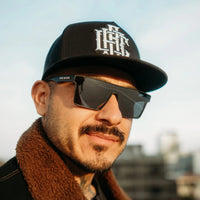 Man wearing Party Shade Polarized Aviator Sunglasses with durable Tr90 frame and UV400 protection