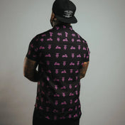 Black shirt with pink motorcycle pattern and hidden collar buttons for a polished look