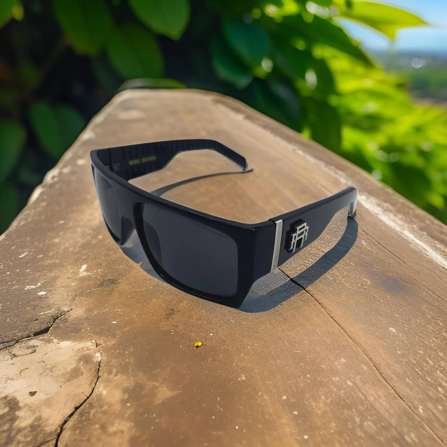 Retro squared polarized sunglasses with silver accents, perfect for Rebel Reaper Tattoo fans