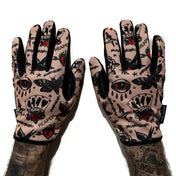 Rogue Tattoo Flash Moto Gloves with tattoo-patterned design and Rebel Reaper motif