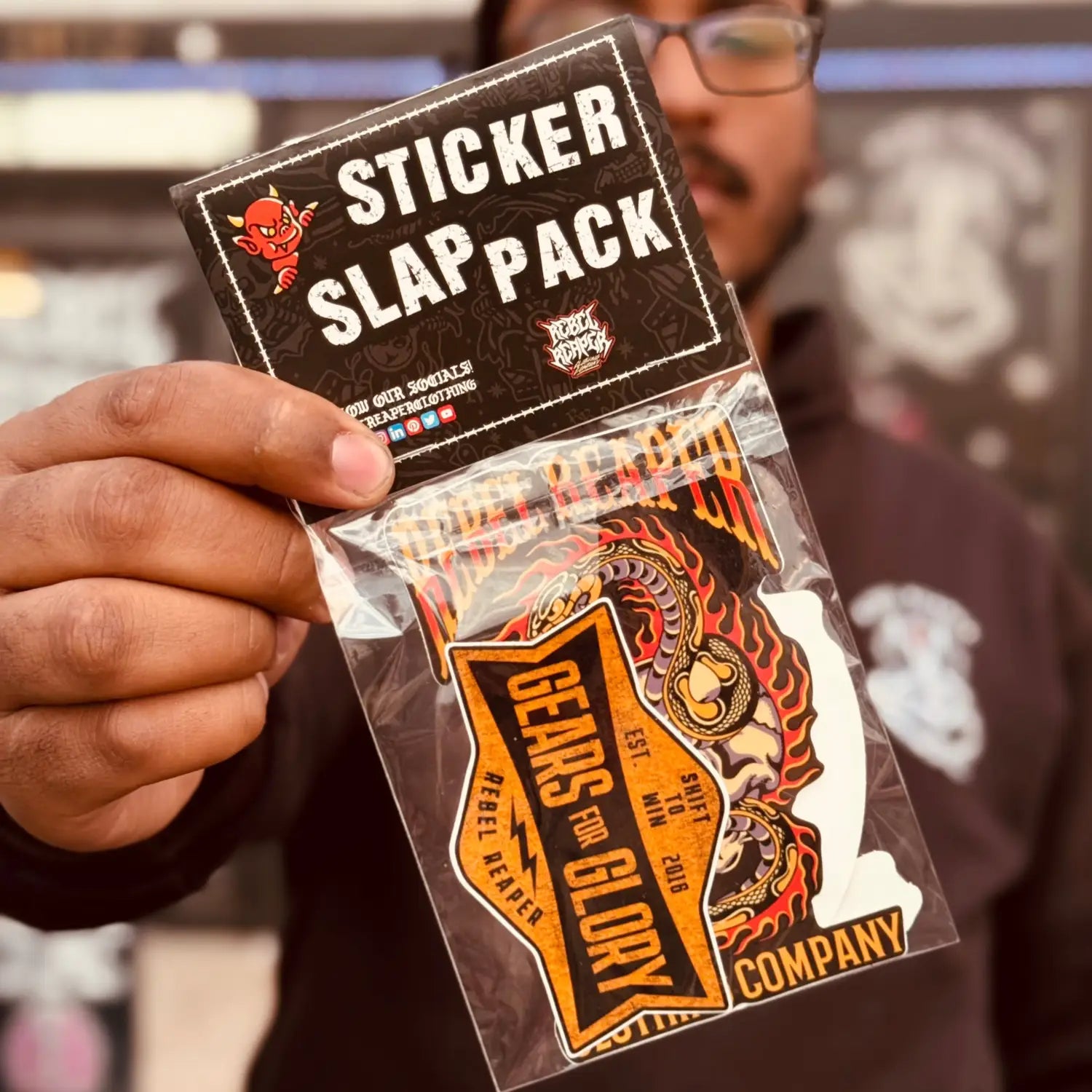 Sticker slap pack with colorful stick ‘em designs for motorcycle outerwear accessories