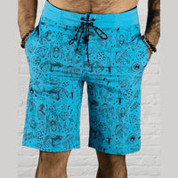 Blue patterned tattoo flash boardshorts made with eco-conscious fabric casual wear featuring velcro pockets