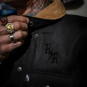 Black jacket with corduroy collar from The Scythe Jacket Black Denim featuring premium selvedge denim