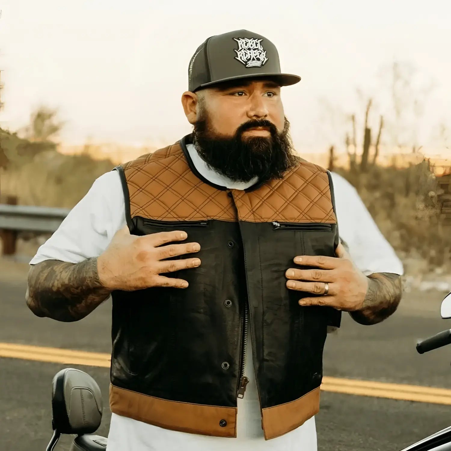 Two-tone cowhide leather motorcycle vest with concealed carry pockets and dual concealed carry design