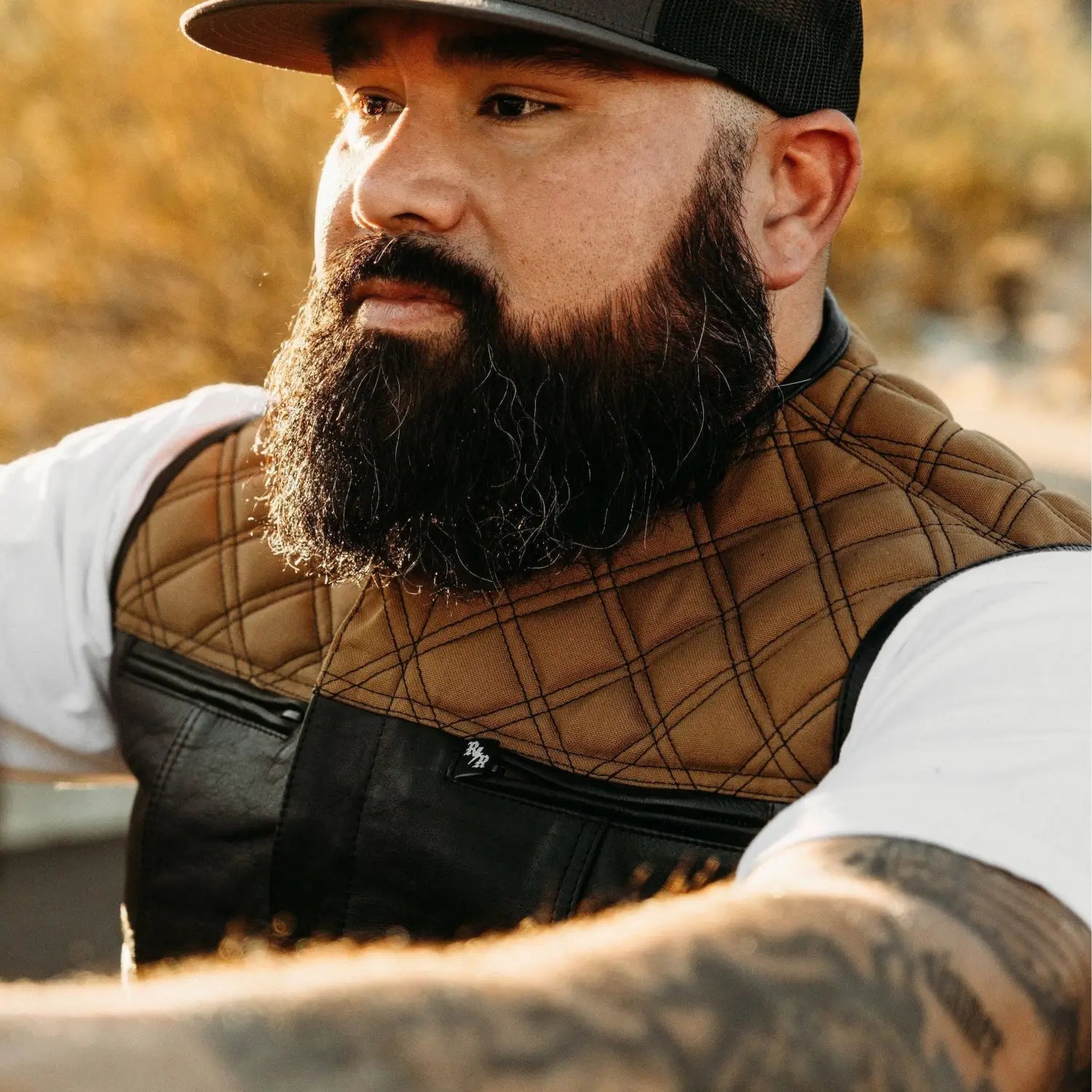 Quilted brown and black cowhide leather vest with dual concealed carry pockets