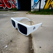 White-framed sunglasses with dark lenses from Vibe Retro UV400 Sunglass Collection
