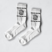 White Barb Wire Crew Socks made from combed cotton, machine washable socks with barbed wire and logo