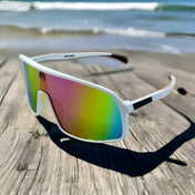 White-framed sunglasses with rainbow lenses from Yeti Shield UV400 Sunglass Collection for legendary protection