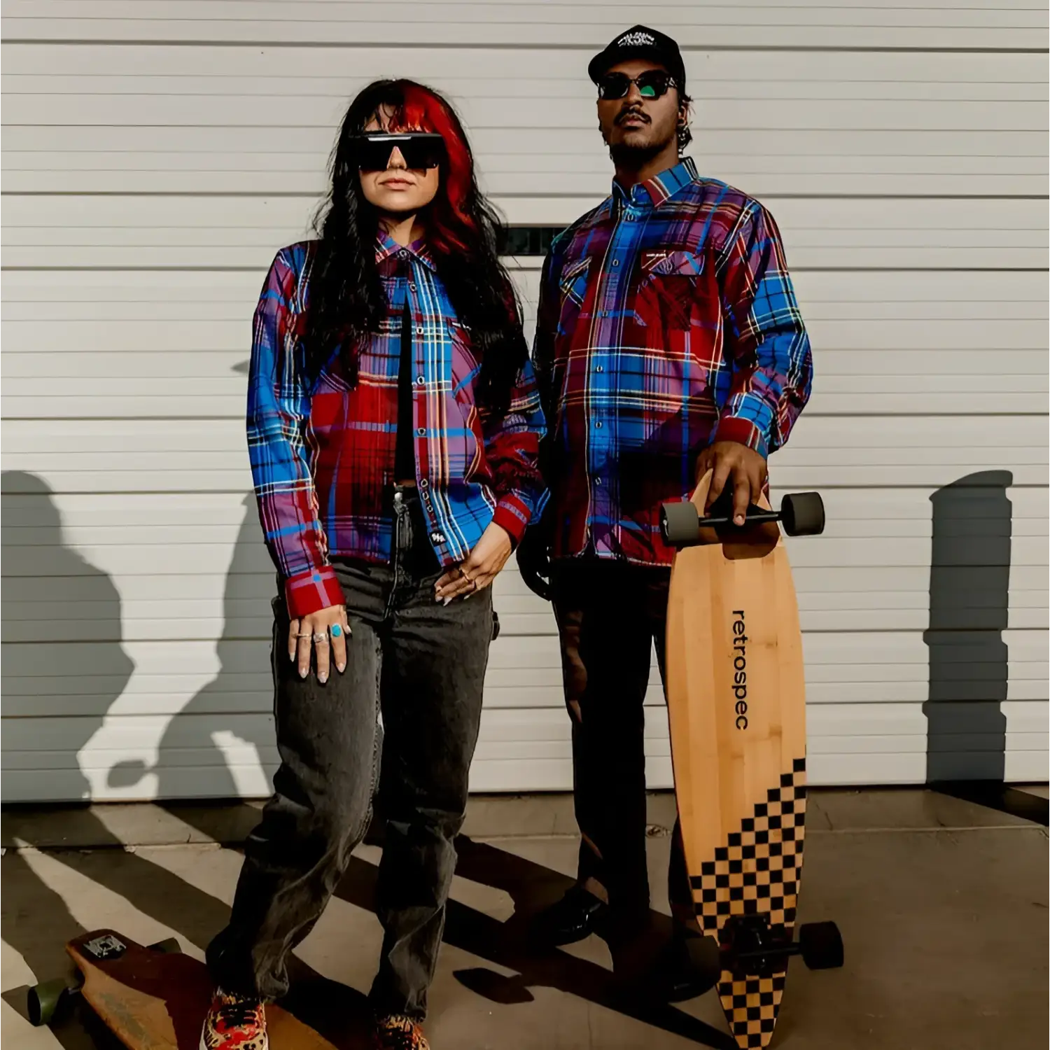 Matching plaid shirts from Zephyr men’s flannel collection, limited edition Rebel Reaper design